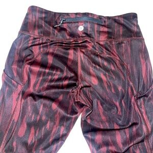Sz 4 Lulu running leggings. Maroon w/ black stripes.